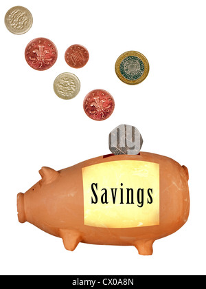 Terracotta pig money box with UK coins Stock Photo