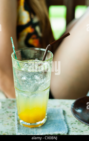 Mango Soda mix juice with girl background Stock Photo