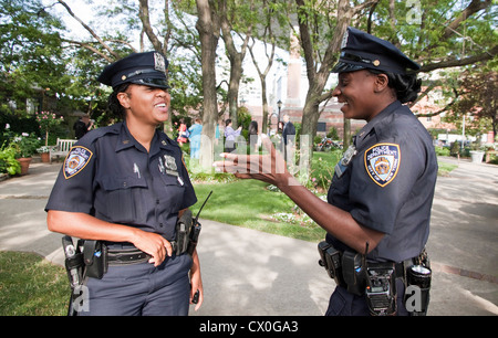 Female police officers having a conversation. Stock Photo