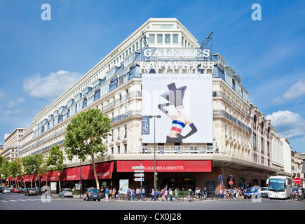 Galeries Lafayette exterior with advertising hoarding boulevard hausmann Paris France EU Europe Stock Photo