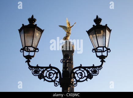 Golden angel of the Column of Victory 'Siegessäule' located in Tiergarten in Berlin, Germany Stock Photo