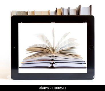 Books and tablet computer isolated on white, digital library concept Stock Photo