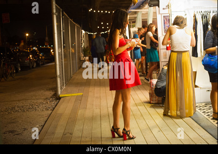 Hordes of shoppers descend on the trendy Meatpacking District in New York during the fourth annual Fashion's Night Out event Stock Photo