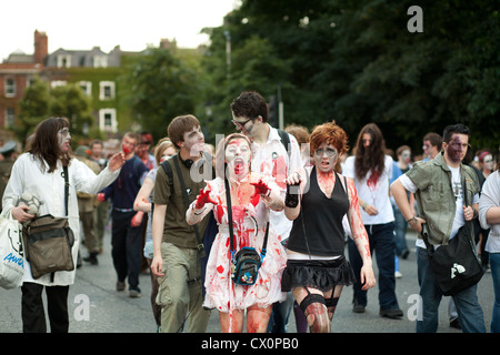 Dublin Zombie Walk - two young zombie girls walking Stock Photo