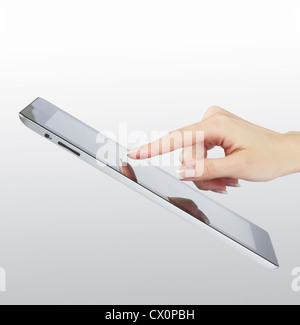 woman hand point on modern electronic digital frame with blank screen Stock Photo