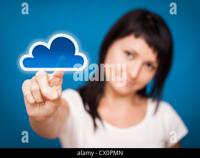 Young woman touch cloud computing button. Stock Photo