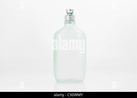 Old Glass perfume bottle in white background Stock Photo