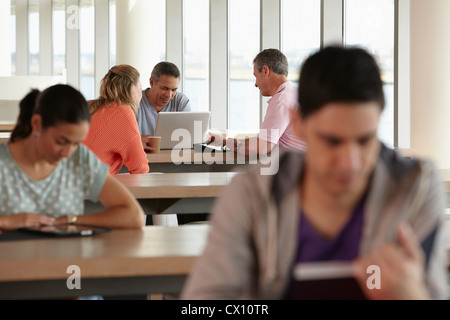 Mature students using laptop Stock Photo