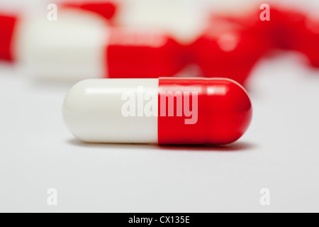 Red and white capsules Stock Photo