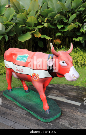 Marche Restaurant cow outside Marche Restaurant in Singapore. Stock Photo