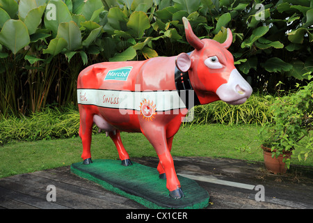 Marche Restaurant cow outside Marche Restaurant in Singapore. Stock Photo