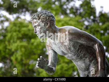 A statue of 'The Runner' in the garden of Achilleion, the summer palace of Sissi, empress Elisabeth of Austria, at Corfu, Greece