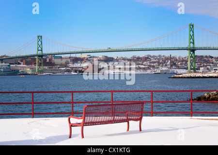 A view of the Angus L MacDonald Bridge linking Halifax and Dartmouth, Nova Scotia, Canada viewed from Dartmouth in winter. Stock Photo