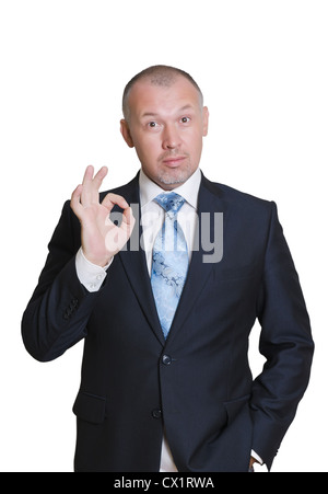 man in a business suit shows fingers sign 'OK' Stock Photo