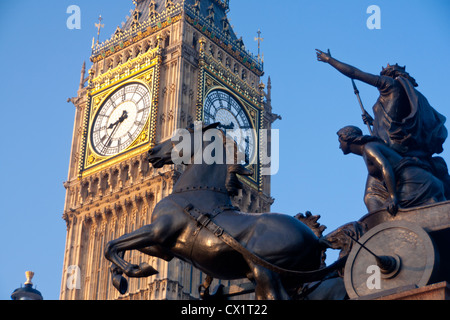 Statue of Boadicea and chariot with Big Ben Clock Tower of Houses of Parliament at sunrise London England UK Stock Photo