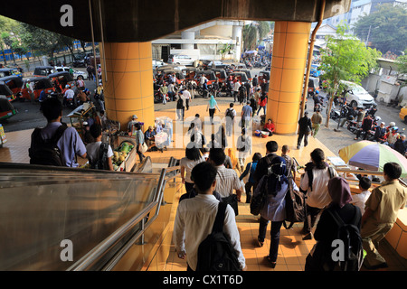 Tuk tuk drivers waiting for passengers at Gambir train station in Jakarta, Indonesia. Stock Photo