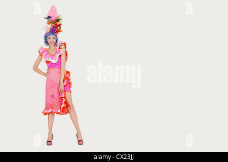 Portrait of beautiful young woman in Brazilian outfit over gray background Stock Photo