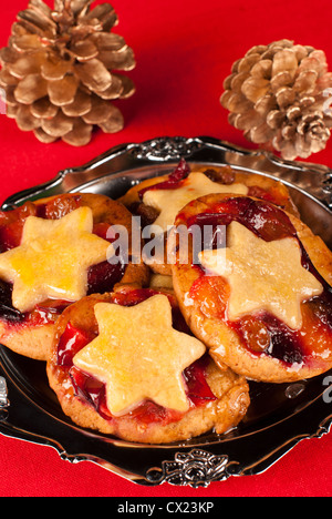 Fruity homemade mince pies on a silver plate Stock Photo