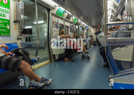 Jersey City, NJ, USA, People traveling inside Public Subway,Underground tube, PATH Train, To New York, tube train interiors Stock Photo