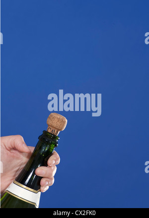 Champagne cork popping, high-speed image. Stock Photo