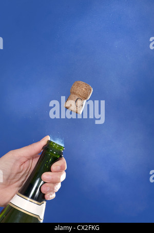 Champagne cork popping, high-speed image Stock Photo