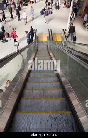 View down unoccupied escalator. Stock Photo