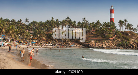 Kovallam beach,Surfer, lighthouse, India Kerala Stock Photo