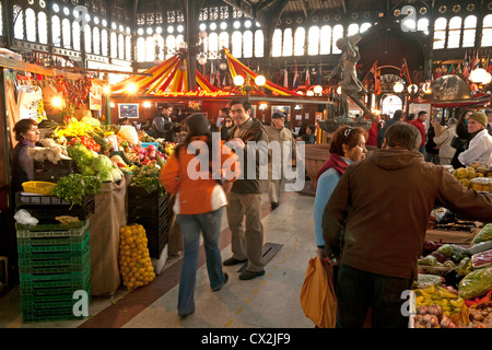 Central market in Santiago de Chile, typical scene, picture 4 of 5 (also in the frame a man meeting his lover or friend) Stock Photo