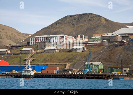 View over harbour and docks of the Russian mining town of Barentsburg, Svalbard, Spitsbergen, Norway Stock Photo