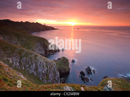 Spectacular sunrise behind Start Point Lighthouse in South Hams, Devon, England. Autumn (September) 2010 Stock Photo