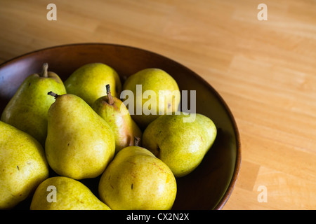 Pears in a wooden bowl, Texas, USA Stock Photo