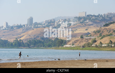 The shore of lake Kinneret near the town of Tiberias in the summer in the morning Stock Photo