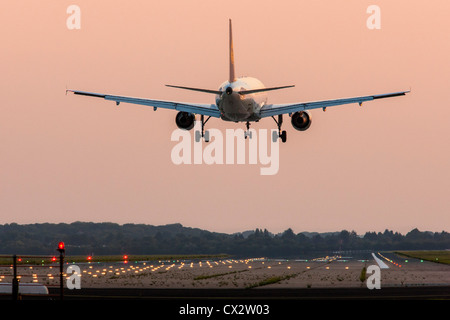 Passenger airplane approaching Düsseldorf International Airport. Germany.