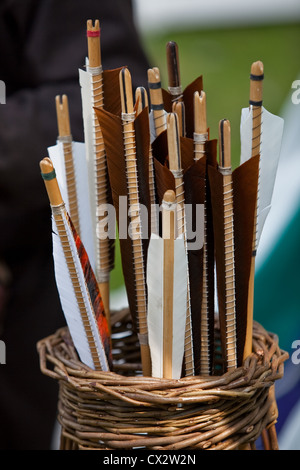 A quiver of hand made arrows on display in the Crafts area of a county fair. Stock Photo