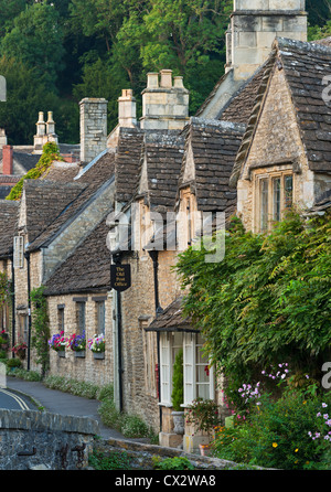 Picturesque cottages in the beautiful Cotswolds village of Castle Combe, Wiltshire, England. Autumn (September) 2012. Stock Photo