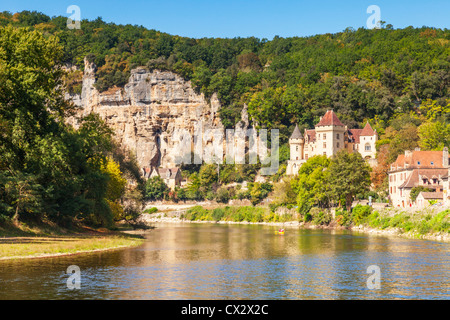 The River Dordogne at La Roque-Gageac, with the Chateau de la Marartrie on the river bank. Stock Photo