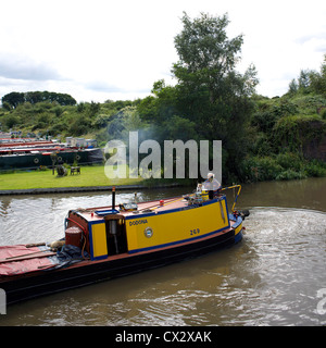 Historic narrowboat Dodona on the Coventry Canal, near Tamworth, Staffordshire, England, UK, narrow, boat, boats, boating, Stock Photo