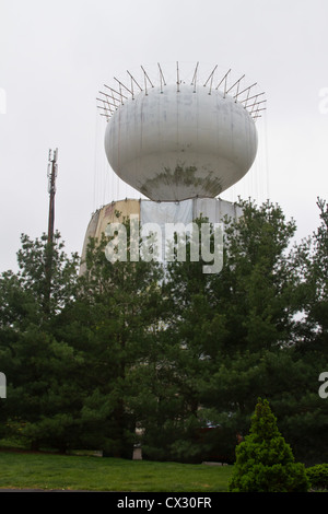 Water tower being repaired and painted Stock Photo