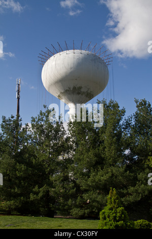 Water tower being repaired and painted Stock Photo