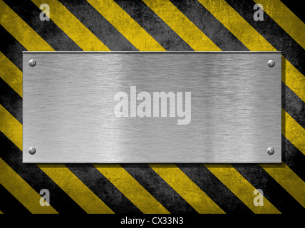 metal plate background with hazard stripes Stock Photo