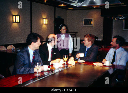 Restaurant Nippon-kan Restaurant Japanese Waitress and Businessmen Stock Photo