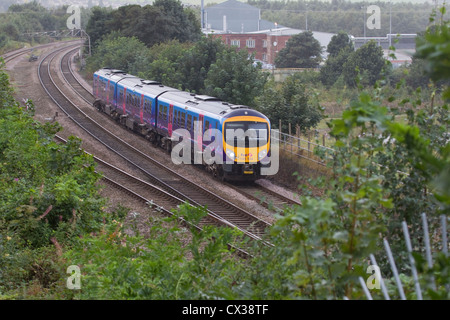 British First Trans Pennine Express train DMU 185 134 heading eastwards through Mirfield en route to Newcastle Stock Photo