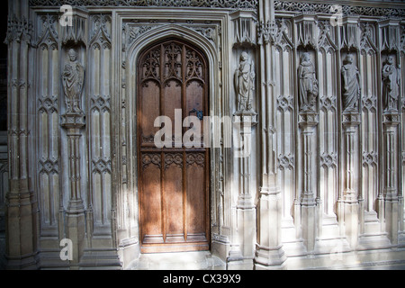 Winchester Cathedral Interior Architecture - wall carvings and door - Hampshire UK Stock Photo