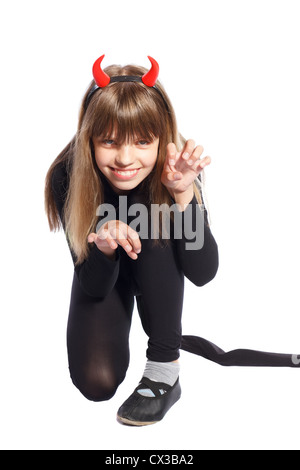 girl in devil costume waving his tail on a white background Stock Photo