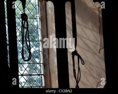 Bell ropes in St Mary's Church in Burgate,Suffolk. Stock Photo