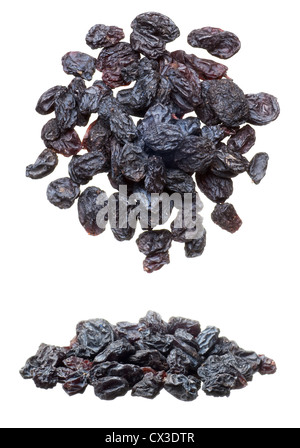 Closeup of black raisins heap isolated on white Stock Photo