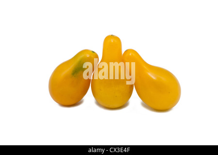 three yellow tomatoes isolated on white background Stock Photo