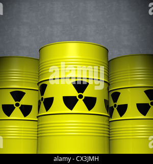 3 Fässer mit Atommüll vor einer Betonwand - Three Clean Yellow Steel Barrels with Nuclear Waste Stock Photo