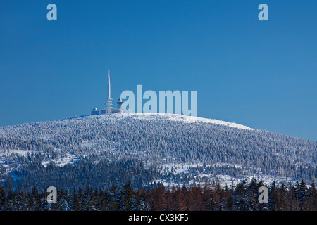 The Brocken Transmitter, old and new transmission tower on the Brocken in the snow in winter, Saxony-Anhalt, Germany Stock Photo