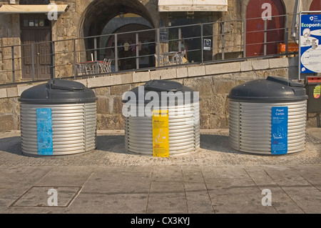 PORTUGAL, Oporto, recycling bins for domestic rubbish, glass bottles, plastic and metal Stock Photo